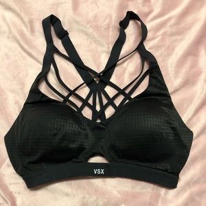 Black 34C VSX sports bra. Padded. Cross front